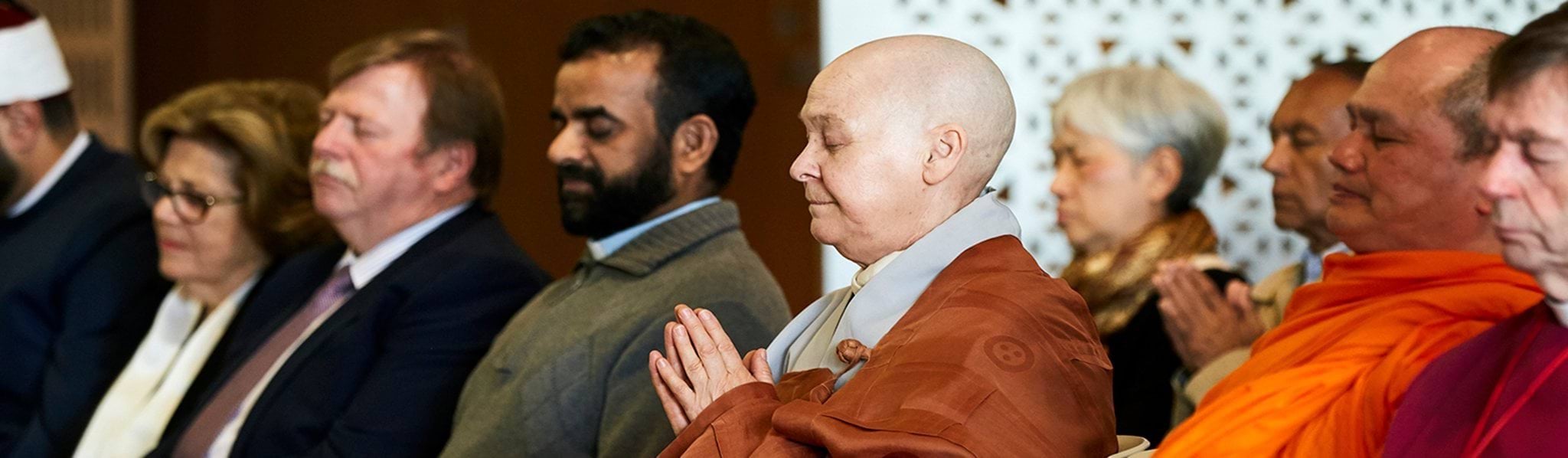 Members of Multifaith Advisory Group praying together