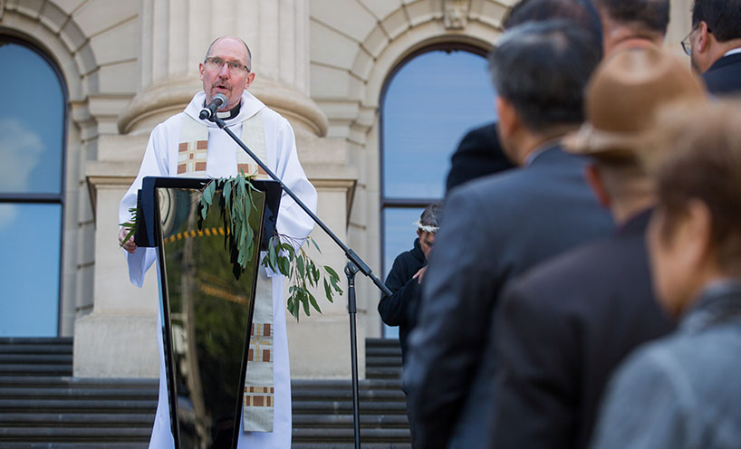 Parliamentary Chaplain Reverend Dr Hugh Kempster leading prayers 