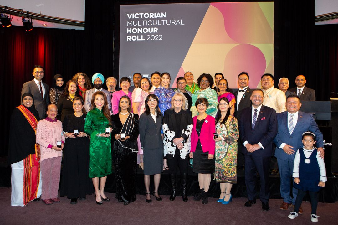 Group of recipients accepting an award